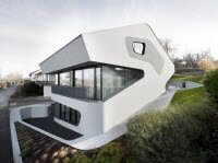 В доме OLS открывается вид из зияющей пасти динозавра