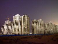 Китай планирует переселить 250 млн. человек в города к 2025 году