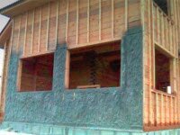 Устройство теплоизоляции каркасных стен