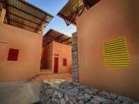 Детский дом Falatow Jigiyaso охлаждается полностью природной вентиляции и зеленого строительства