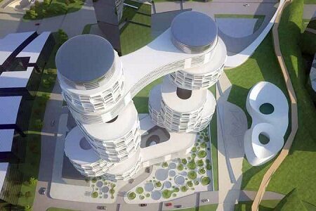 Вело башни от Asymptote увенчаны зелеными крышами и связанны СкайБриджом